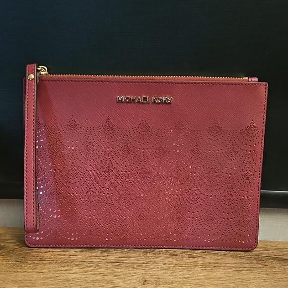New Michael Kors Burgundy Laser-Cut Wristlet - Picture 1 of 8